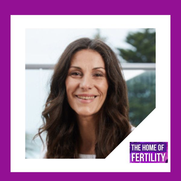 Australian Fertility Summit Founder and Creation Coach Liz Walton, image of Liz - blonde long hair with blue eyes, with hand under chin facing the camera